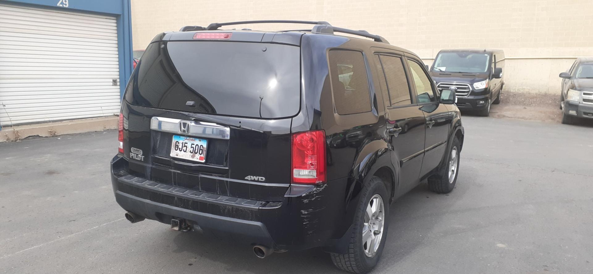 2011 Honda Pilot EX-L 4WD 5-Spd AT (5FNYF4H55BB) with an 3.5L V6 SOHC 24V engine, 5-Speed Automatic transmission, located at 2015 Cambell Street, Rapid City, SD, 57701, (605) 342-8326, 44.066433, -103.191772 - CARFAX AVAILABLE - Photo#1